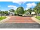 Picturesque street featuring manicured landscaping and inviting homes at 10135 Blakeney Preserve Dr, Charlotte, NC 28277