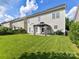 A spacious backyard with lush green grass and a cozy gazebo on the patio at 1016 Yellow Daisy Dr, Matthews, NC 28104
