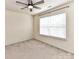 Carpeted bedroom features a window and ceiling fan offering a calm atmosphere at 1016 Yellow Daisy Dr, Matthews, NC 28104