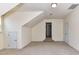 Bonus room provides extra space and features wall to wall carpet and dormer at 1016 Yellow Daisy Dr, Matthews, NC 28104
