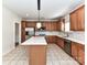 Well-equipped kitchen featuring a center island, stainless steel appliances, and lots of cabinets at 1016 Yellow Daisy Dr, Matthews, NC 28104