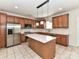 Spacious kitchen with stainless steel appliances, a center island, and ample counter space at 1016 Yellow Daisy Dr, Matthews, NC 28104