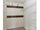 Walk-in closet has custom shelving and clothing racks for organization at 1016 Yellow Daisy Dr, Matthews, NC 28104