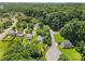 An aerial view of a lovely neighborhood featuring mature trees and well-maintained lawns at 10621 Glenmac Rd, Charlotte, NC 28215