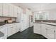 Kitchen featuring a white refrigerator and plenty of cabinet space at 116 Birchwood Ct, Mount Holly, NC 28120