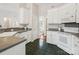 Kitchen featuring white cabinets and modern appliances at 116 Birchwood Ct, Mount Holly, NC 28120