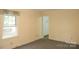 Bedroom with window to exterior view and closet access at 1270 N Enochville Ave, China Grove, NC 28023