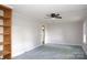 Bedroom with built-in shelves, ceiling fan and natural light at 1270 N Enochville Ave, China Grove, NC 28023