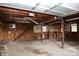 Spacious garage with exposed wooden beams, offering ample storage and work space at 1270 N Enochville Ave, China Grove, NC 28023