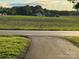 Scenic view of property featuring road and agricultural field at 1270 N Enochville Ave, China Grove, NC 28023