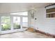 Bright sunroom with large windows and a ceiling fan, perfect for enjoying natural light at 1270 N Enochville Ave, China Grove, NC 28023