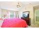 Bright bedroom with vaulted ceilings and large window provides lots of natural light at 14018 Drake Watch Ln, Charlotte, NC 28262