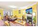 Spacious living room featuring hardwood floors, a fireplace, and comfortable seating at 14018 Drake Watch Ln, Charlotte, NC 28262