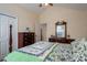 Warm bedroom showcases lovely blanket and offers generous closet space at 1483 Dawnview Ln, Lincolnton, NC 28092