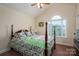 Charming bedroom with vaulted ceiling, a ceiling fan, and a large window at 1483 Dawnview Ln, Lincolnton, NC 28092
