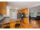 Open concept kitchen showcases stainless appliances and seamless flow to living area at 1483 Dawnview Ln, Lincolnton, NC 28092
