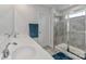 Well-lit bathroom featuring dual sinks, a glass shower, and a neutral color palette at 151 Outrigger Ln, Troutman, NC 28166