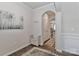 Elegant foyer with hardwood floors, decorative accents, and a view into the home's layout at 151 Outrigger Ln, Troutman, NC 28166