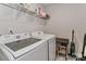 Bright laundry room features Samsung washer and dryer set and wire shelving at 151 Outrigger Ln, Troutman, NC 28166