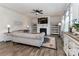 Inviting living room with comfortable seating, a fireplace, and built-in bookshelves at 151 Outrigger Ln, Troutman, NC 28166