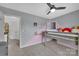 Charming bedroom featuring a whimsical design, unique bunkbed, and contemporary ceiling fan at 15737 Agincourt Dr, Huntersville, NC 28078