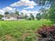 Expansive backyard featuring lush lawn and mature trees, perfect for outdoor activities and relaxation at 1625 Damascus Cir, Conover, NC 28613
