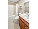 Well-lit bathroom featuring a combination tub and shower, toilet, and vanity with mirror at 1625 Damascus Cir, Conover, NC 28613