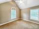 This spacious bedroom features plush carpet, natural light, and neutral decor at 1625 Damascus Cir, Conover, NC 28613