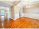 Elegant dining room with hardwood floors, chandelier, and wainscoting detail offers a sophisticated space at 1625 Damascus Cir, Conover, NC 28613