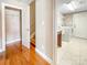 Convenient laundry room with modern washer and dryer, storage shelves, and tiled floor at 1625 Damascus Cir, Conover, NC 28613