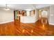 Open concept living area with hardwood floors flowing into kitchen, great for entertaining at 1625 Damascus Cir, Conover, NC 28613