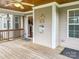 Inviting screened porch with decorative accents and access to the home's interior at 1625 Damascus Cir, Conover, NC 28613