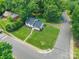 Aerial view of a charming home with a well-manicured lawn in a quiet neighborhood at 1645 Brookdale Ave, Charlotte, NC 28210