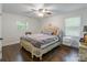 Bedroom with traditional decor, wood floor, and natural light at 1645 Brookdale Ave, Charlotte, NC 28210