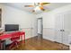 Home office area with built in storage, wood floors, and natural light at 1645 Brookdale Ave, Charlotte, NC 28210