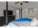 Bedroom featuring a bed with wood frame and view into en suite bathroom at 166 Rumple Hill Dr, Statesville, NC 28677