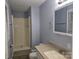 Bathroom featuring walk-in shower with updated fixtures, vanity, and toilet at 1660 Songwood Rd, Concord, NC 28025