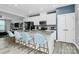 Modern kitchen with stainless appliances, granite countertops, stylish island with seating at 1723 Town Oak Ln, Charlotte, NC 28205