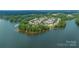 Stunning aerial view of a lakeside community with beautiful homes surrounded by nature at 188 Lilac Mist Loop, Mooresville, NC 28115