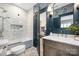 Well-appointed bathroom boasts a stylish vanity, marble countertop, and luxurious bathtub at 188 Lilac Mist Loop, Mooresville, NC 28115