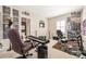 This is a bedroom with carpet, neutral walls, and music-themed decor, with an open door to the bathroom at 188 Lilac Mist Loop, Mooresville, NC 28115