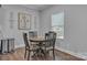 Cozy dining area with natural light and a view of the backyard at 19455 Smith Cir, Cornelius, NC 28031