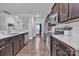 Modern kitchen with stainless steel appliances and granite countertops at 19455 Smith Cir, Cornelius, NC 28031
