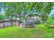 Spacious backyard with pool, shed, and surrounding greenery creating a private oasis at 200 W 14Th St, Salisbury, NC 28144