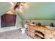Bathroom under sloped ceiling, features tile floor and a double sink vanity at 200 W 14Th St, Salisbury, NC 28144