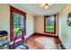 Simple bedroom with original hardwood floors and two big windows at 200 W 14Th St, Salisbury, NC 28144