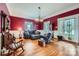 Inviting living room featuring hardwood floors, ample seating, and a lovely fireplace at 200 W 14Th St, Salisbury, NC 28144