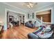Cozy living room with hardwood floors, dining room and staircase access at 200 W 14Th St, Salisbury, NC 28144