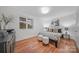 Bright bedroom with hardwood floors, stylish furniture, and large windows at 201 N Dotger Ave # C8, Charlotte, NC 28207