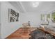 Stylish bedroom featuring hardwood floors, a desk area, and ample natural light at 201 N Dotger Ave # C8, Charlotte, NC 28207